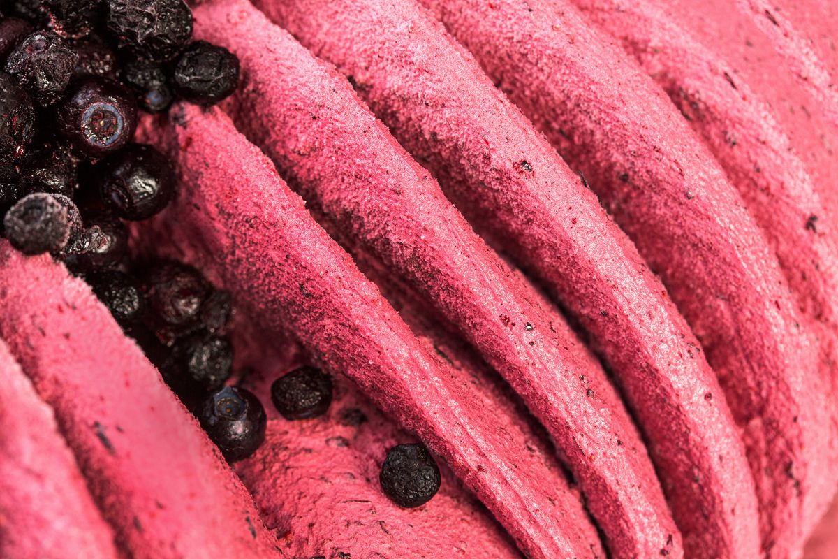 Close up of raspberry ice-cream with blueberries